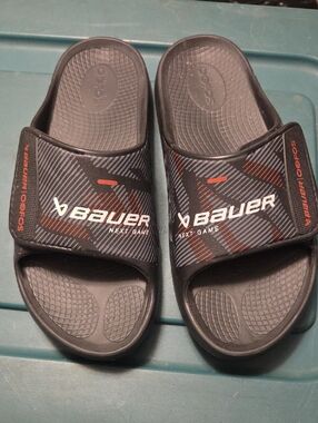 OOFOS Black Slide Sandals with Orange and White Accents. Mens 9/ Womens 11